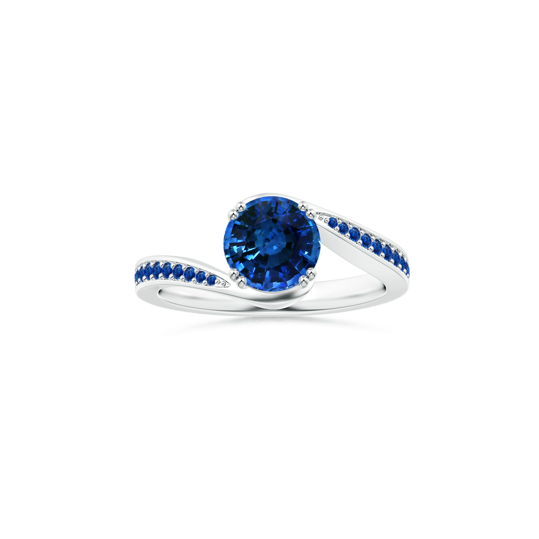 Blue Sapphire Criss Cross Ring with Diamond Halo | Angara
